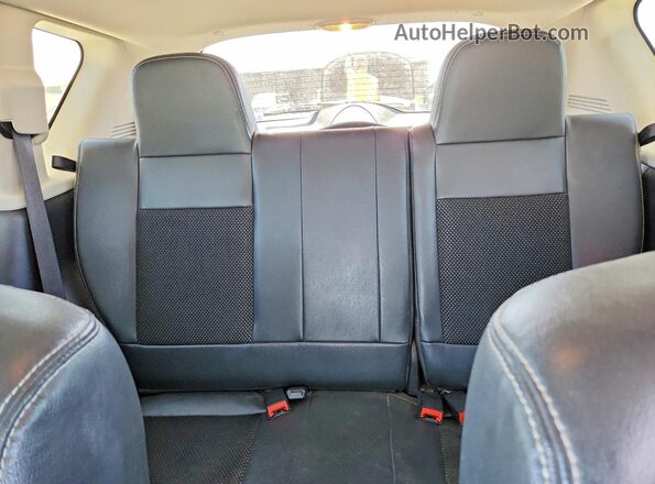 1C4NJDEB7GD733119 2016 JEEP COMPASS Silver Rear seats view