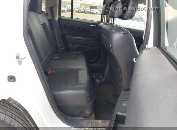 1C4NJPBA7GD604052 2016 JEEP PATRIOT White Vista de la etiqueta del VIN