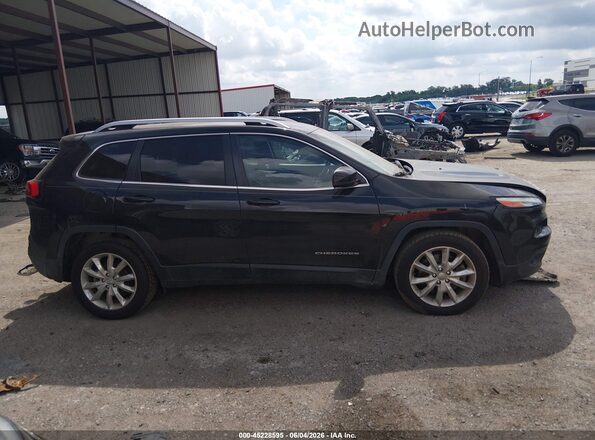 1C4PJLDB6GW336090 2016 JEEP CHEROKEE Black Rear interior view