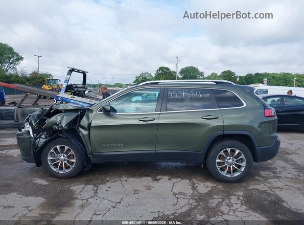 1C4PJMLX0KD323603 2019 JEEP CHEROKEE Green Vista interior trasera
