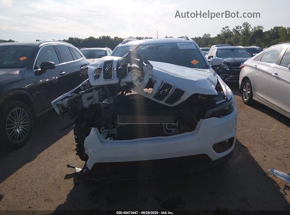 1C4PJMMX2MD158400 2021 JEEP CHEROKEE White Vista interior trasera