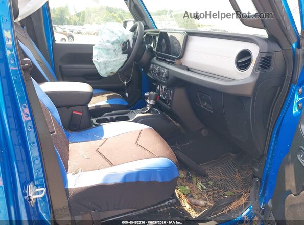 1C4PJXDG7TW213301 2026 JEEP WRANGLER Blue Vista interior delantera