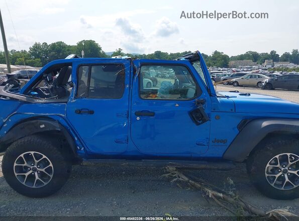 1C4PJXDG7TW213301 2026 JEEP WRANGLER Blue Vista interior trasera