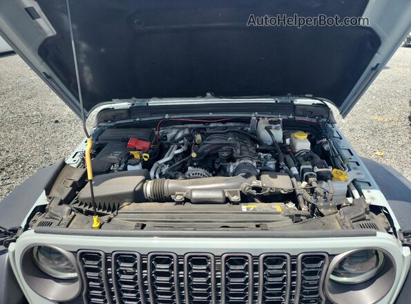 1C4PJXDG8RW247224 2024 JEEP WRANGLER Blue Vista interior trasera