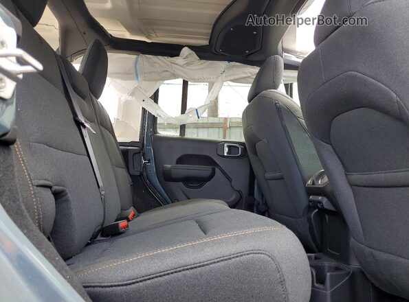1C4PJXDN8TW192053 2026 JEEP WRANGLER Teal Սալոնի հետևի տեսք