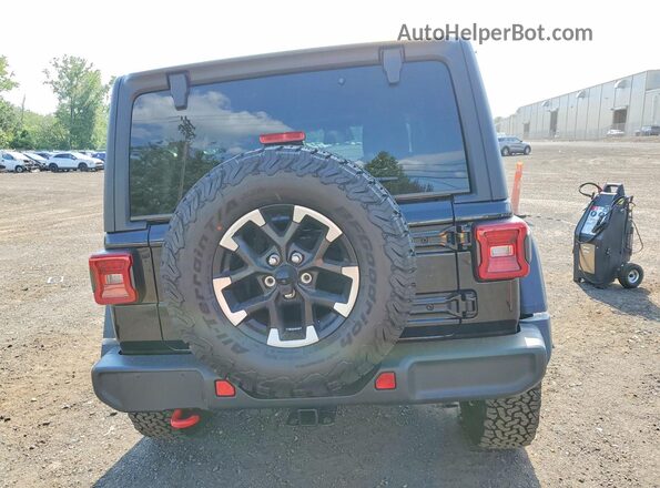 1C4PJXFN1TW268340 2026 JEEP WRANGLER Black Rear view