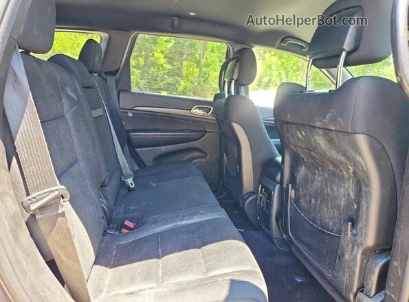1C4RJFAG8GC377770 2016 JEEP GRAND Charcoal Vista interior trasera
