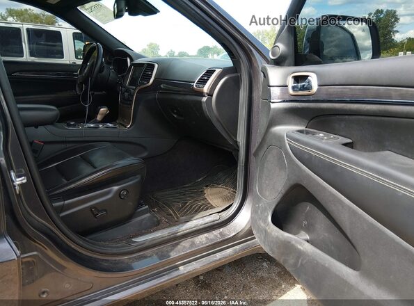 1C4RJFCG9GC378665 2016 JEEP GRAND CHEROKEE Silver Front interior view