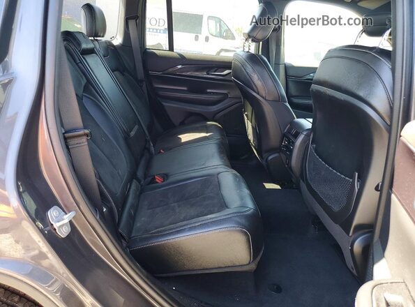 1C4RJHAG7P8765636 2023 JEEP GRAND Gray Vista interior trasera