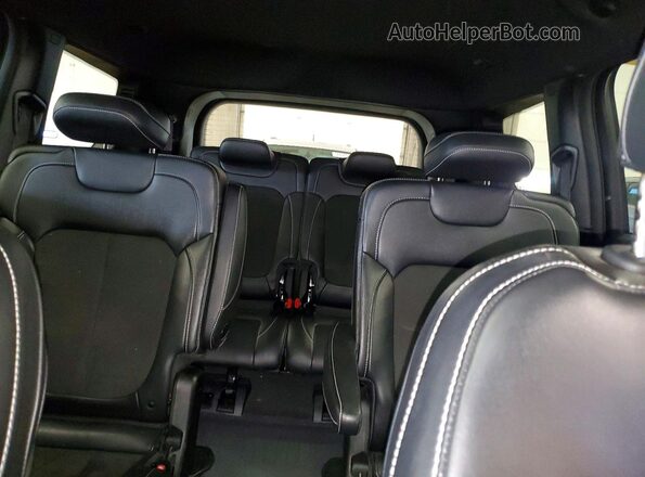 1C4RJKAG9P8830242 2023 JEEP GRAND Black Vista de los asientos traseros