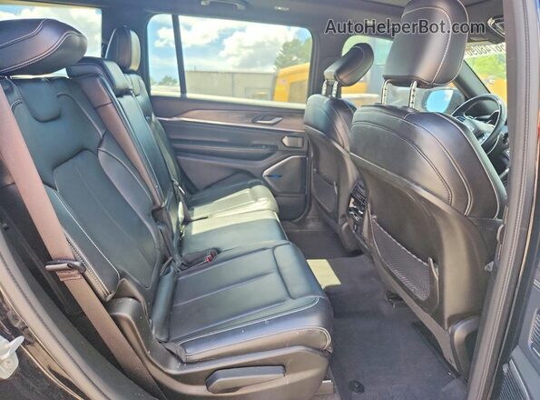 1C4RJKDG3M8132152 2021 JEEP GRAND Black Rear interior view