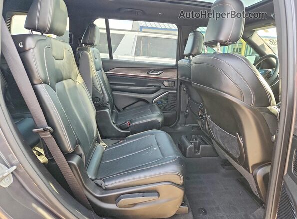 1C4RJKDG6P8841419 2023 JEEP GRAND Charcoal Vista interior trasera