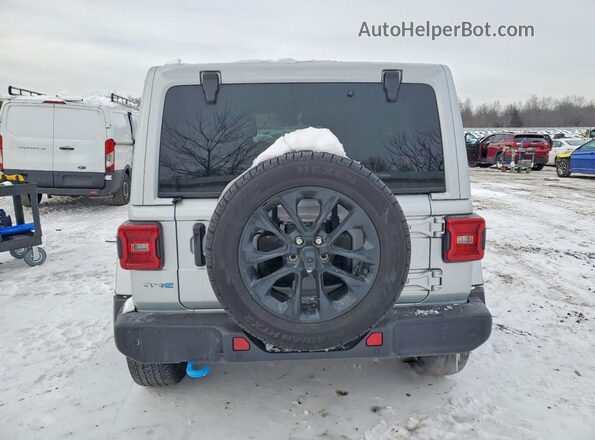 1C4RJXP60RW210714 2024 JEEP WRANGLER Silver Вид ззаду