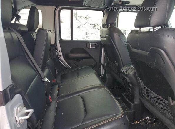 1C4RJXP60RW210714 2024 JEEP WRANGLER Silver Вид задньої частини салону