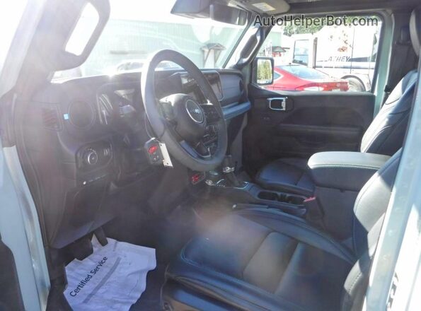 1C4RJXR65RW126935 2024 JEEP WRANGLER Silver Widok wnętrza z przodu