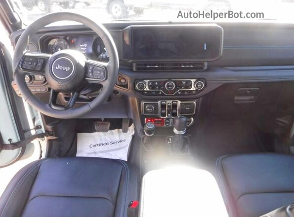 1C4RJXR65RW126935 2024 JEEP WRANGLER Silver Widok deski rozdzielczej