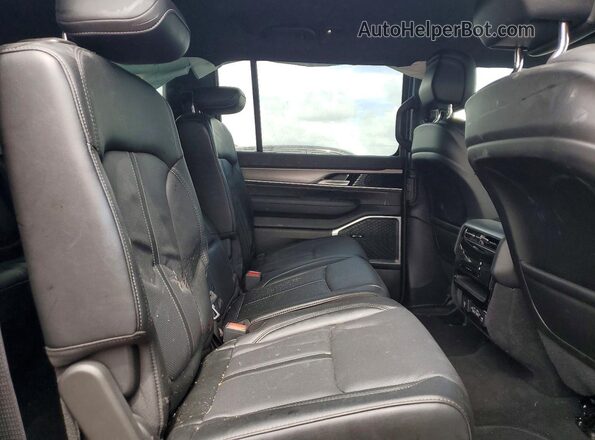 1C4SJSBP0TS158875 2026 JEEP GRAND Black Вид задньої частини салону