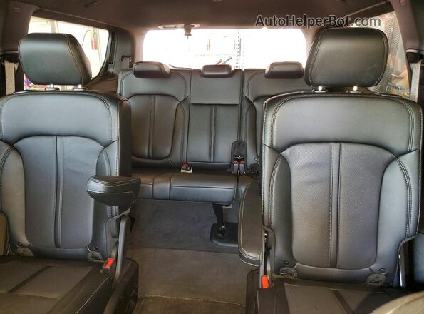1C4SJVBP7TS179871 2026 JEEP GRAND Gray Vista de los asientos traseros