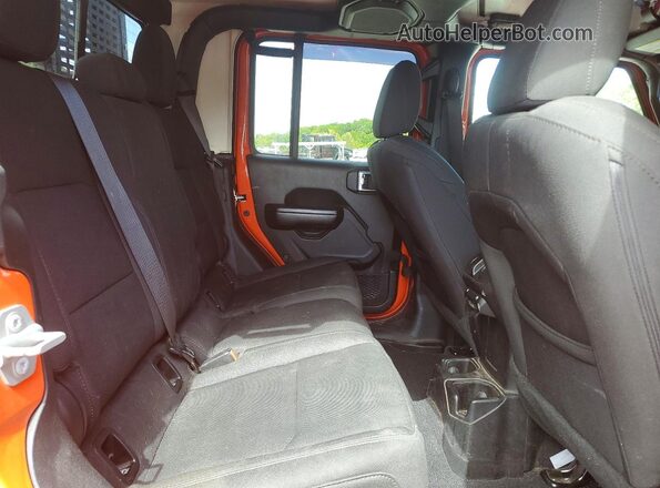 1C6HJTAG4LL146523 2020 JEEP GLADIATOR Orange Vista de los asientos traseros