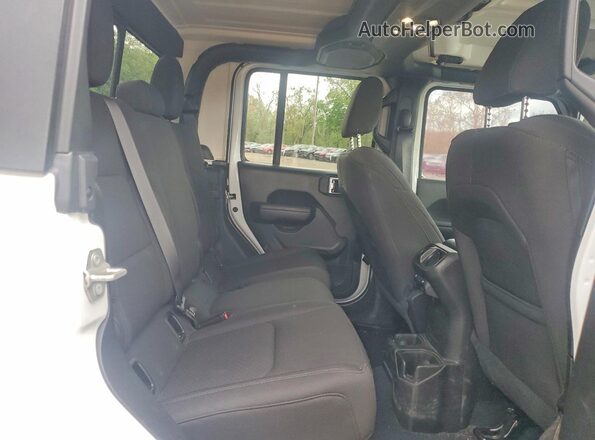 1C6JJTAG0PL585709 2023 JEEP GLADIATOR White Rear interior view