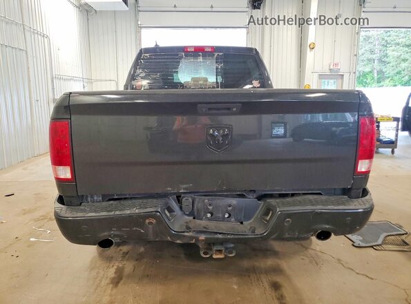 1C6RR7TT7JS178867 2018 RAM 1500 Black Rear view