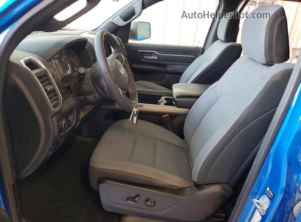 1C6RREFT4RN151975 2024 RAM 1500 Blue Front interior view