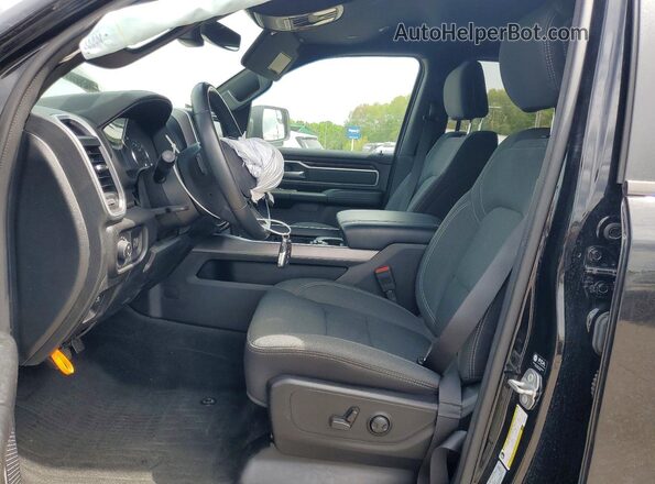 1C6RRFFG3PN569997 2023 RAM 1500 Черный Вид салона спереди