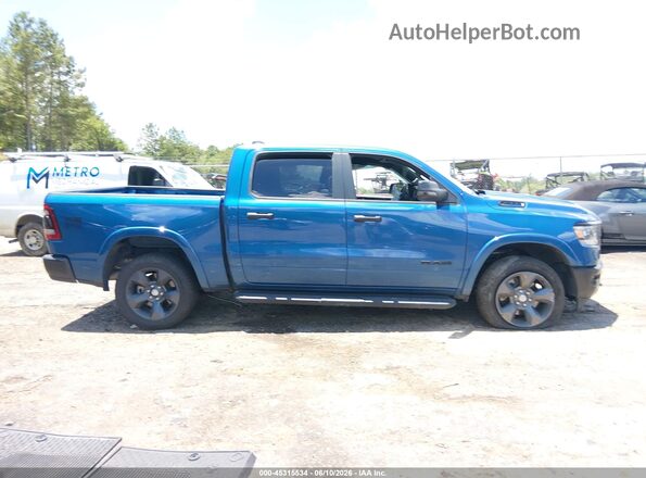 1C6SRFFT5RN232040 2024 RAM 1500 Blue Вид задньої частини салону