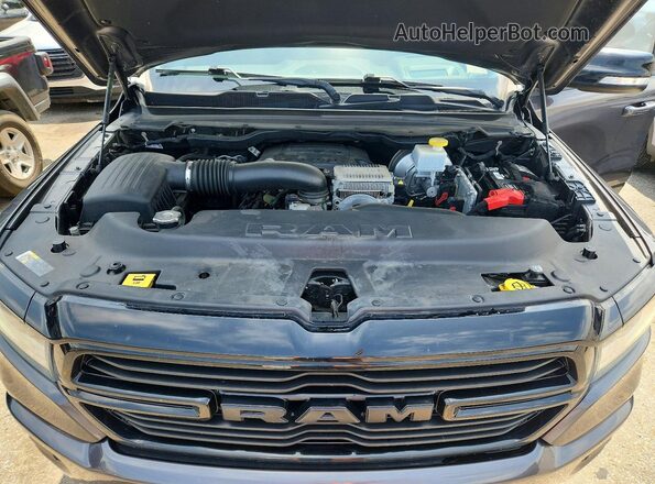 1C6SRFFTXMN708081 2021 RAM 1500 Charcoal Vista interior trasera