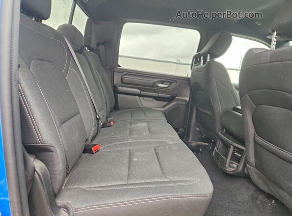 1C6SRFGP7TN202031 2026 RAM 1500 Blue Rear seats view