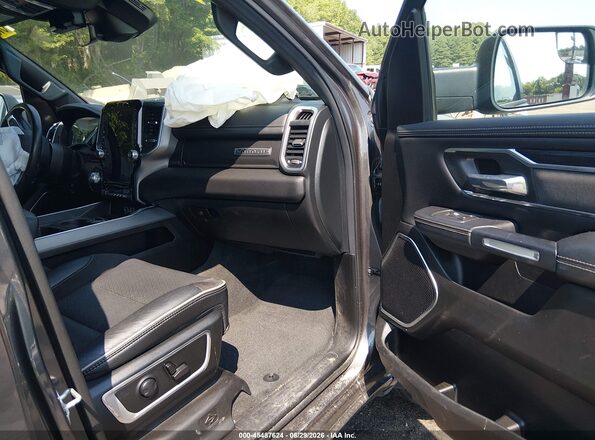 1C6SRFJT6PN643130 2023 RAM 1500 Серый Вид салона спереди
