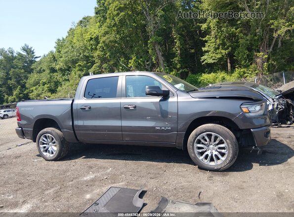 1C6SRFJT6PN643130 2023 RAM 1500 Серый Вид задней части салона