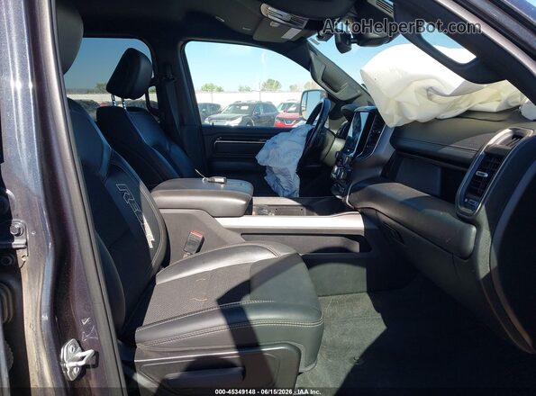 1C6SRFLT1MN802533 2021 RAM 1500 Black Front interior view