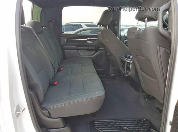 1C6SRFMP7SN645282 2025 RAM 1500 White Vista de los asientos traseros