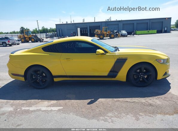 1FA6P8AM6H5299052 2017 FORD MUSTANG Yellow Vista interior trasera