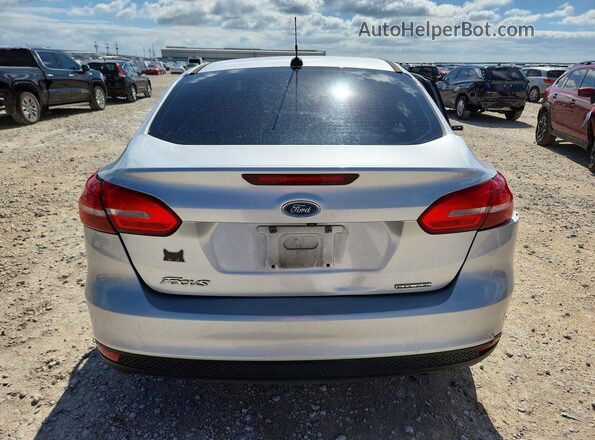 1FADP3E29GL328699 2016 FORD FOCUS Silver Widok z tyłu