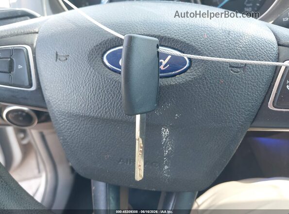 1FADP3E2XGL310552 2016 FORD FOCUS Серебряный Вид панели приборов