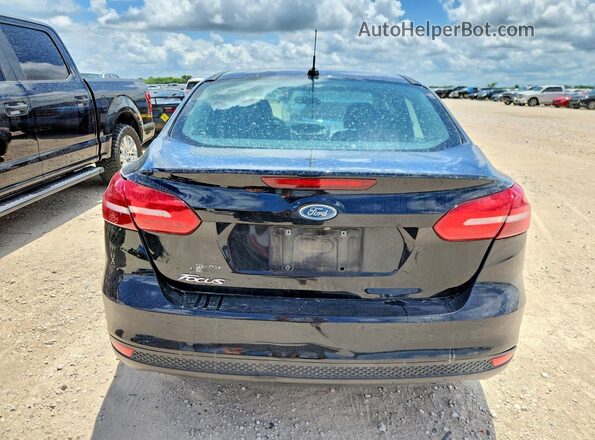 1FADP3E2XJL277477 2018 FORD FOCUS Black Rear view