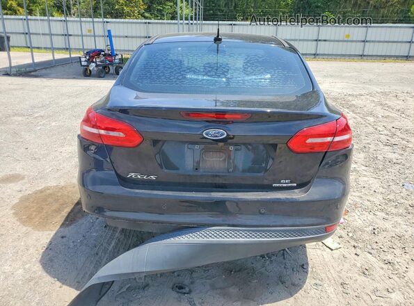 1FADP3F21GL241961 2016 FORD FOCUS Black Вид ззаду