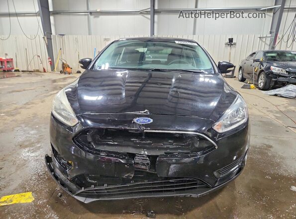 1FADP3F21GL310342 2016 FORD FOCUS Black Front view