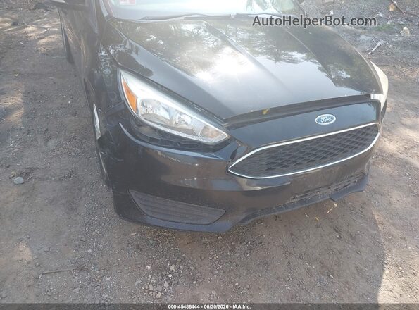 1FADP3F21GL312995 2016 FORD FOCUS Black Front view