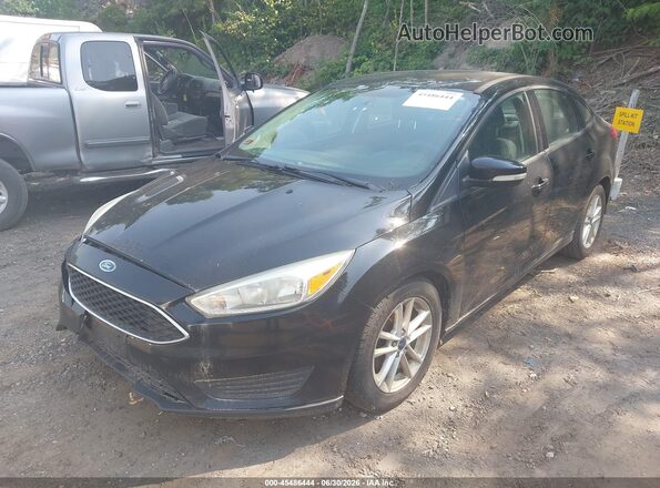 1FADP3F21GL312995 2016 FORD FOCUS Black Front left