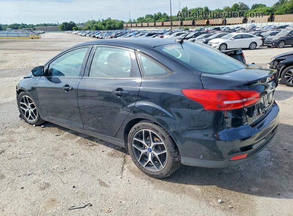 1FADP3F21GL343468 2016 FORD FOCUS Black Rear left