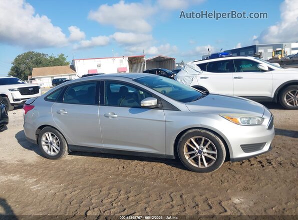 1FADP3F21GL397353 2016 FORD FOCUS Silver Սալոնի հետևի տեսք