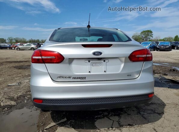 1FADP3F21JL209793 2018 FORD FOCUS Silver Вид ззаду