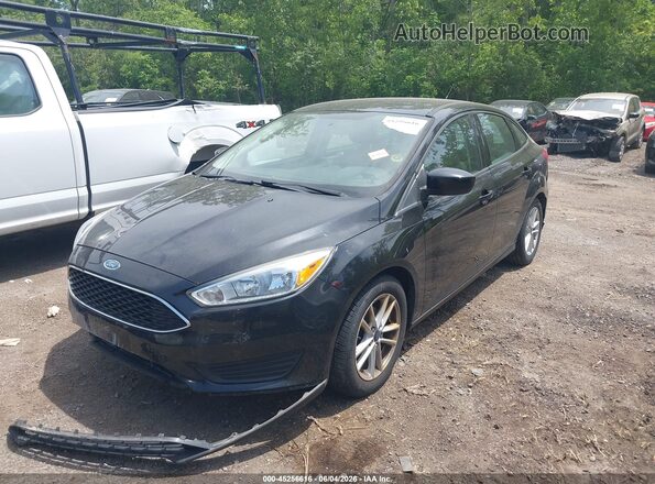 1FADP3F21JL209941 2018 FORD FOCUS Black Front left