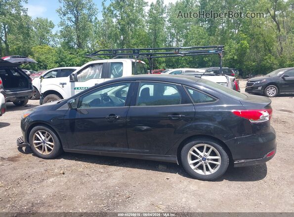 1FADP3F21JL209941 2018 FORD FOCUS Black Rear interior view