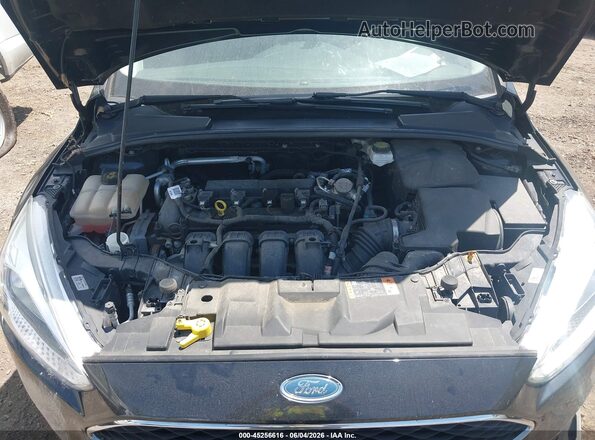 1FADP3F21JL209941 2018 FORD FOCUS Black Rear view
