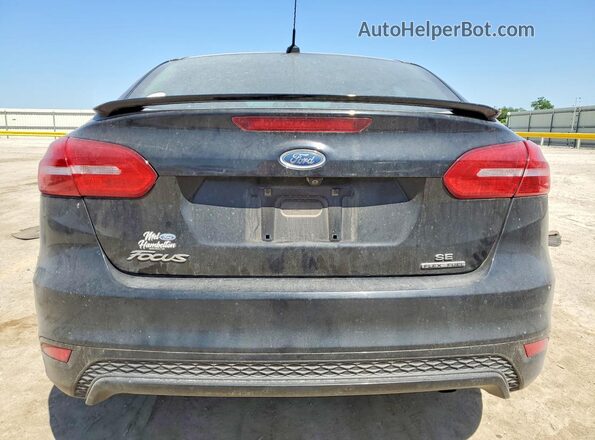 1FADP3F22GL379427 2016 FORD FOCUS Черный Вид сзади