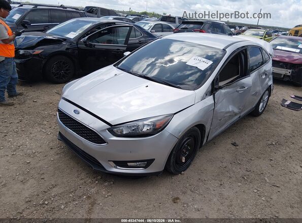 1FADP3F22GL383204 2016 FORD FOCUS Silver Vista tres cuartos delantera izquierda